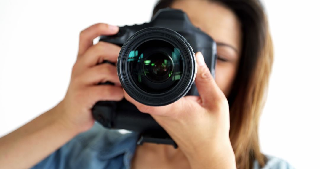 Photographer capturing image with DSLR camera - Free Images, Stock Photos and Pictures on Pikwizard.com