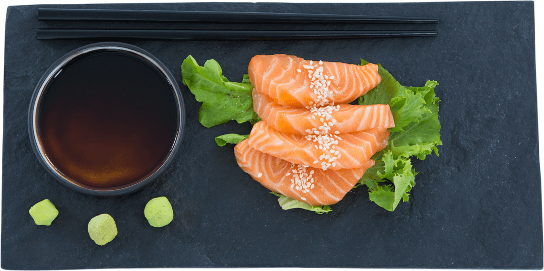 Transparent Arrangement of Fresh Salmon Slices with Soy Sauce