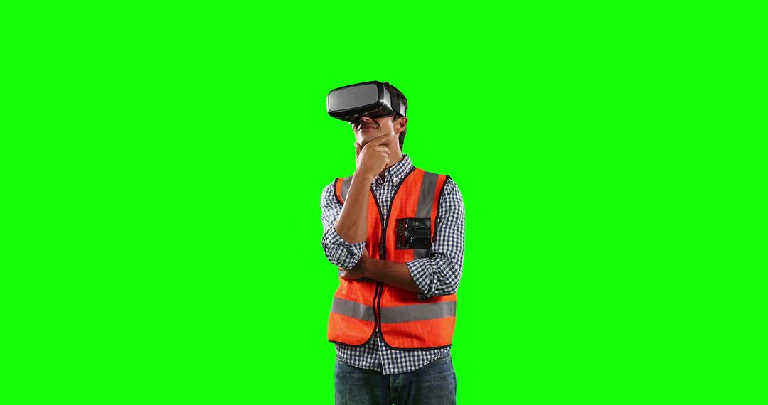 Engineer in Safety Vest Using Virtual Reality Glasses - Free Images, Stock Photos and Pictures on Pikwizard.com