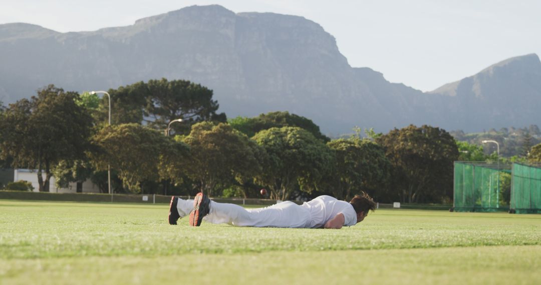 Cricket Player Lying on Field During Practice - Free Images, Stock Photos and Pictures on Pikwizard.com