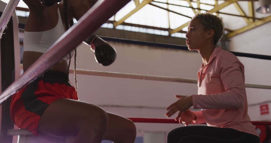 Female Boxing Coach Encouraging Trainee in Gym - Free Images, Stock Photos and Pictures on Pikwizard.com