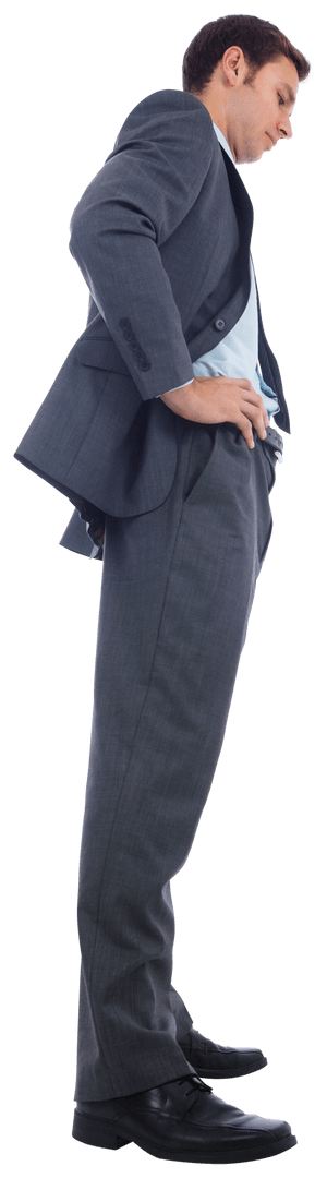 Serious Businessman Standing with Hands on Hips in Suit on Transparent Background