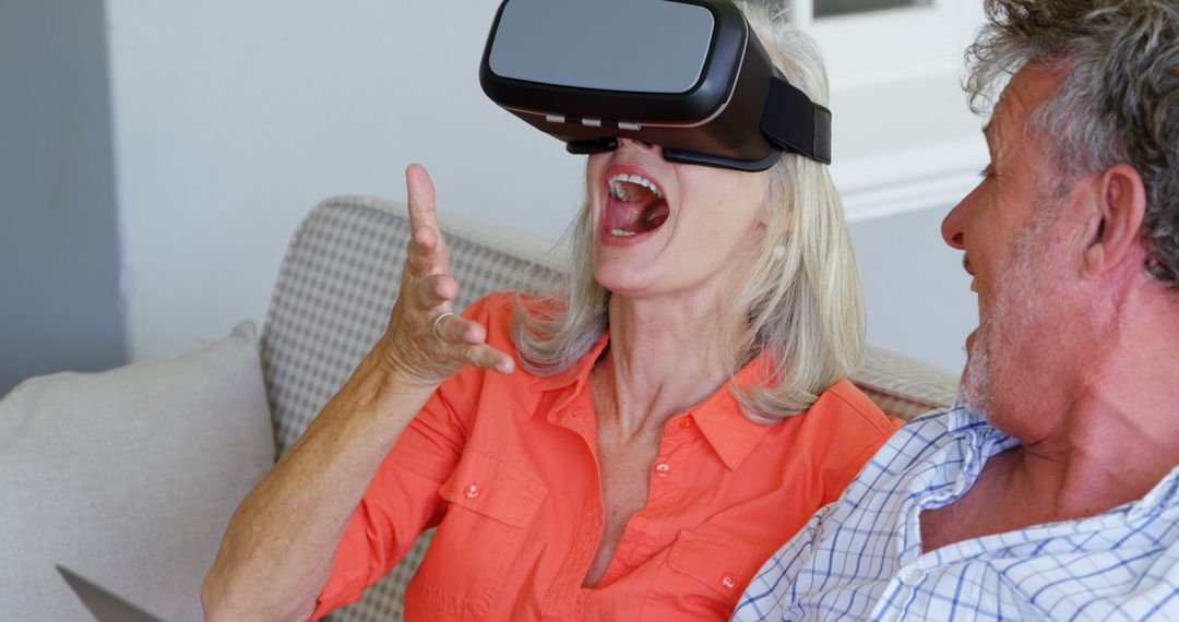 Elderly Couple Enjoying Virtual Reality Experience with VR Headset - Free Images, Stock Photos and Pictures on Pikwizard.com