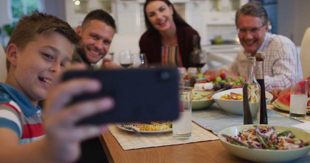 Family Taking Smartphone Selfie During Dinner Gathering - Free Images, Stock Photos and Pictures on Pikwizard.com