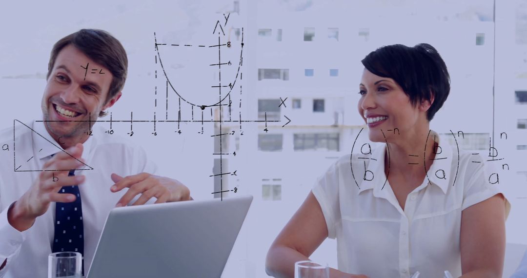 Business Professionals Analyzing Data with Mathematical Overlay