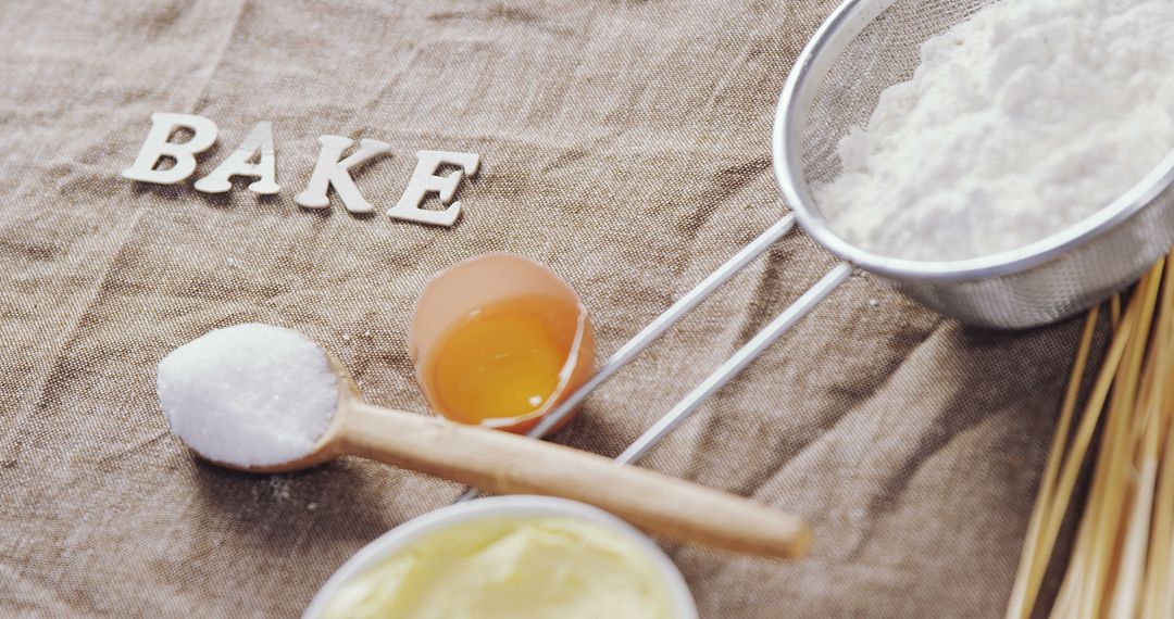 Baking Ingredients and Tools on Rustic Cloth Background - Free Images, Stock Photos and Pictures on Pikwizard.com