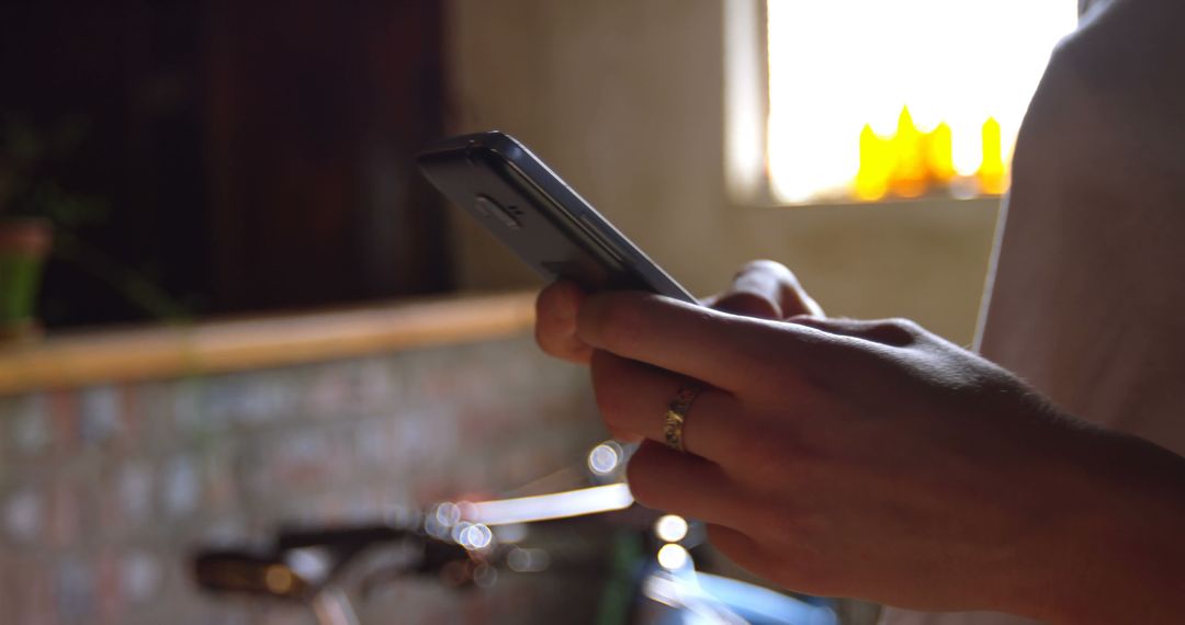 Close-Up of Person's Hands Holding Smartphone Indoors - Free Images, Stock Photos and Pictures on Pikwizard.com