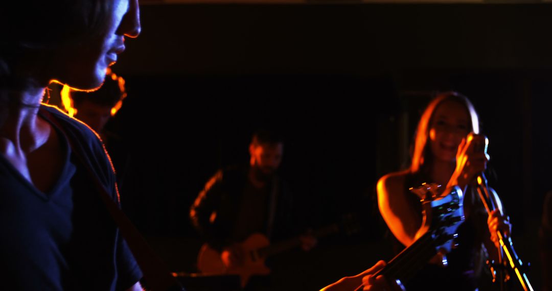 Energetic Live Band Performance Under Stage Lights