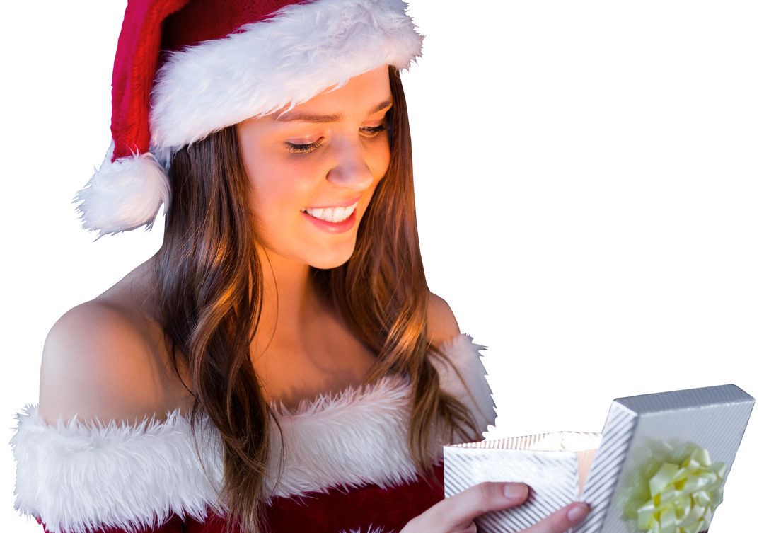 Smiling Young Woman in Santa Hat Opening Christmas Gift on Transparent Background - Download Free Stock Images Pikwizard.com