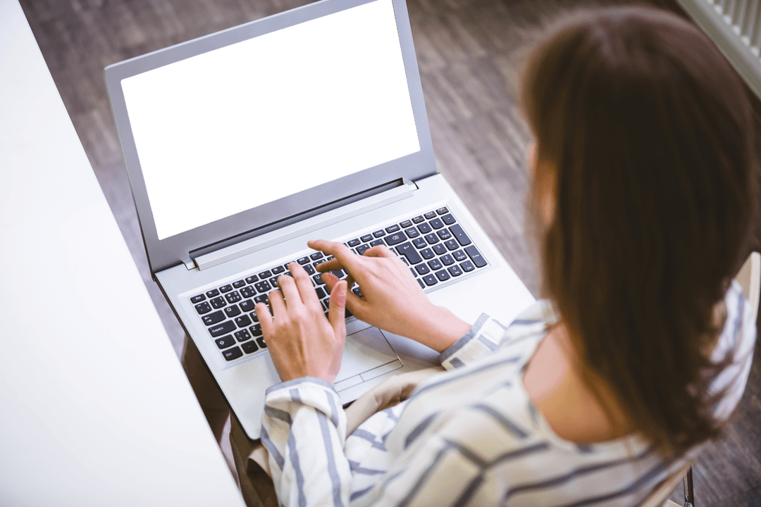 Transparent Laptop Display with Businesswoman Working at Desk