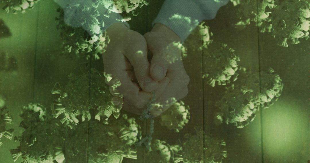 Hands Clasped Amidst Virus Imagery Symbolizing Unity and Resilience