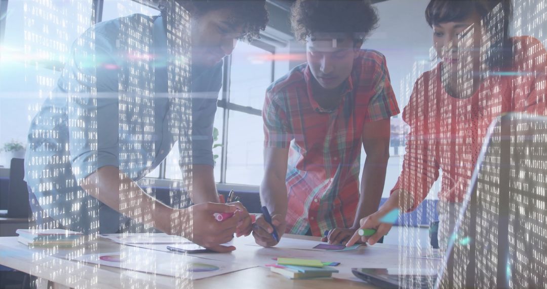 Diverse Team Collaborating on Innovative Project with Data Overlay