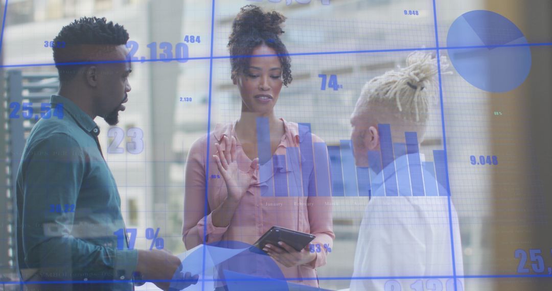 Diverse Team Analyzing Business Growth Data with Technology