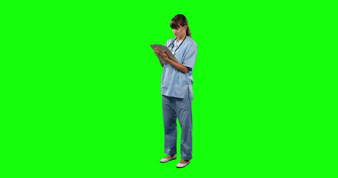 Nurse Reading Patient Chart on Green Screen Background - Free Images, Stock Photos and Pictures on Pikwizard.com