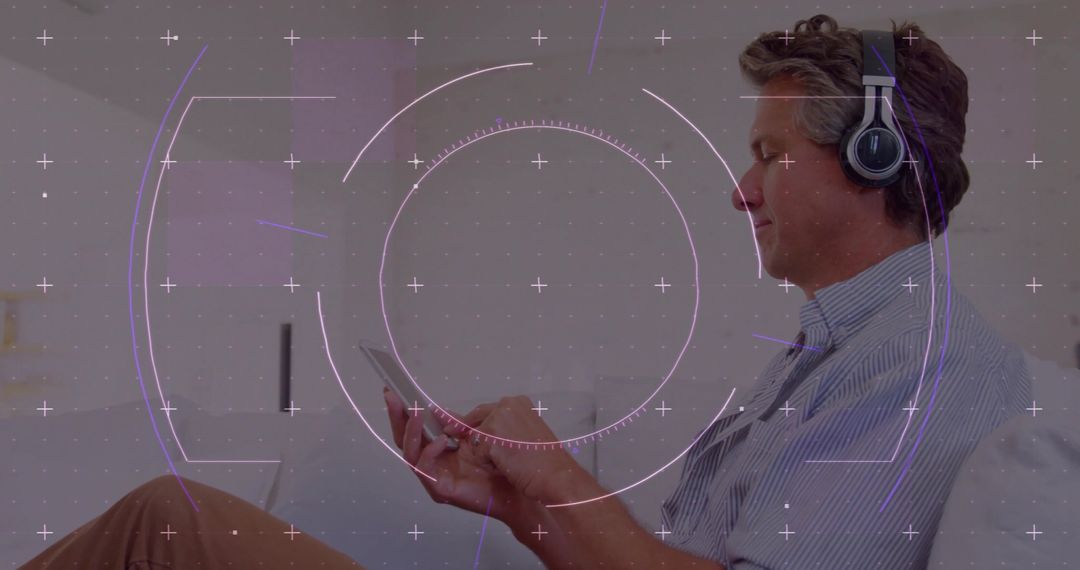 Man Using Tablet with Headset in Modern Digital Environment