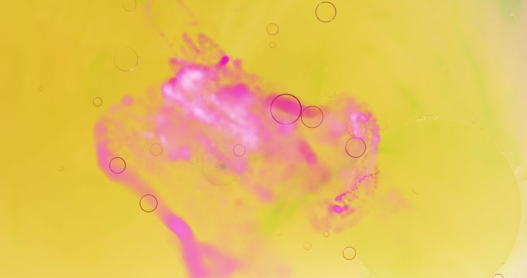 Colorful Abstract Liquid Dynamics on Yellow Background