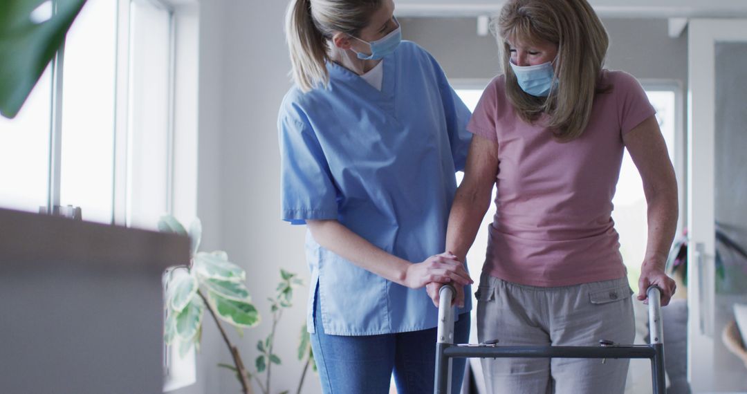 Nurse Assist Elderly Woman Walking with Walker in Home - Free Images, Stock Photos and Pictures on Pikwizard.com