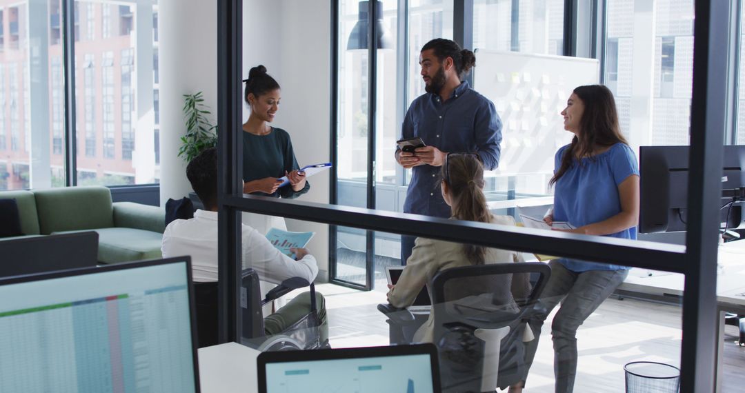 Diverse Team Engaging in Casual Office Meeting