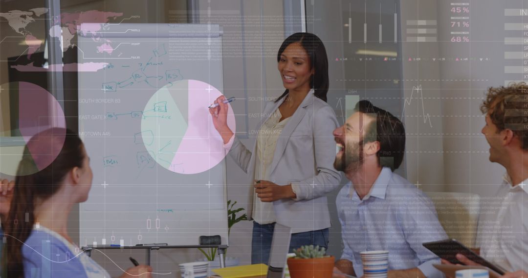 Diverse Team Engaged in Business Presentation with Overlayed Charts