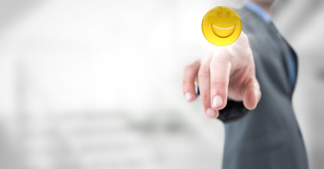 Businessman Pointing at Smiling Emoji in Modern Office - Free Images, Stock Photos and Pictures on Pikwizard.com