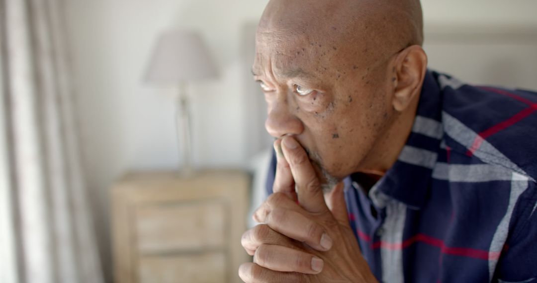 Contemplative Elderly African American Man Thinking Indoors - Free Images, Stock Photos and Pictures on Pikwizard.com