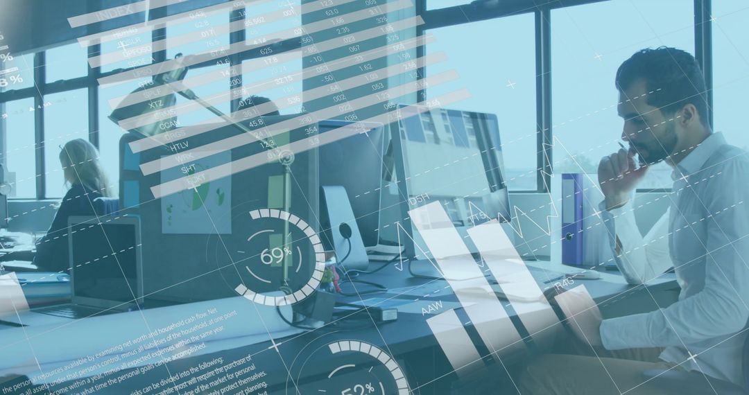 Business analyst studying live dashboards in modern open office with HUD data overlays