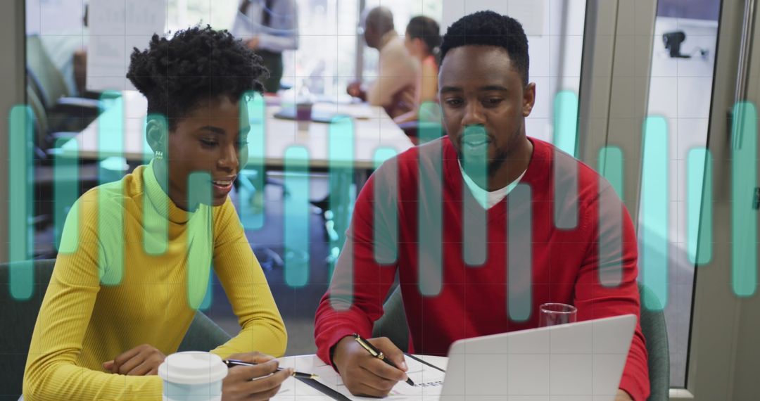 Diverse Business Team Analyzing Data with Digital Elements