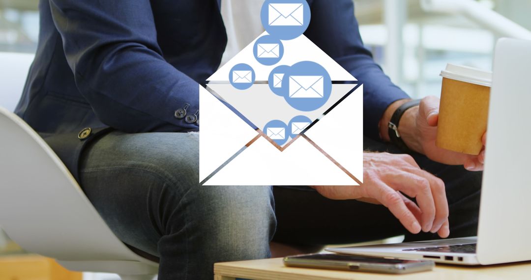Man Checking Emails Overlaid with Digital Envelope Icons