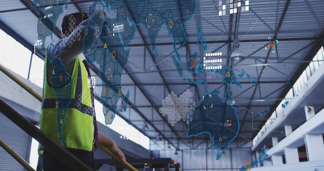Warehouse Technician Pointing at Holographic Global Map Showing Supply Chain Data