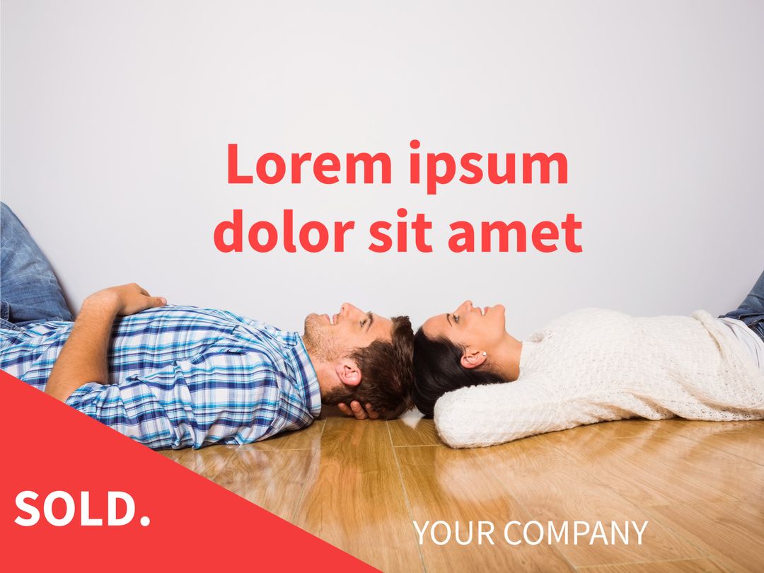 Happy Couple Relaxes After Home Purchase on Wooden Floor