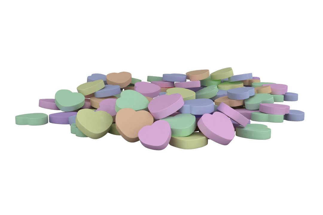 Colorful Transparent Heart Shaped Pills on Surface
