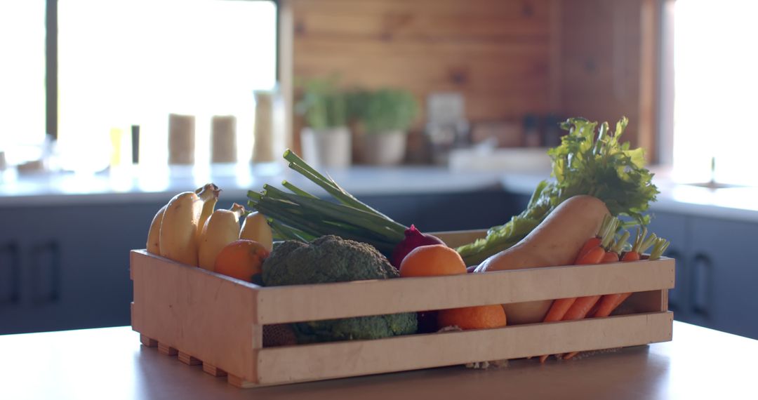 Fresh Organic Produce in Wooden Crate on Kitchen Counter - Free Images, Stock Photos and Pictures on Pikwizard.com