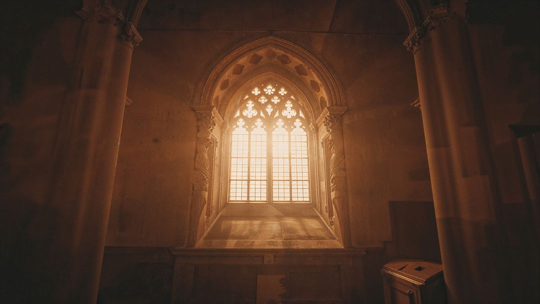 Gothic Cathedral Window with Streaming Amber Light