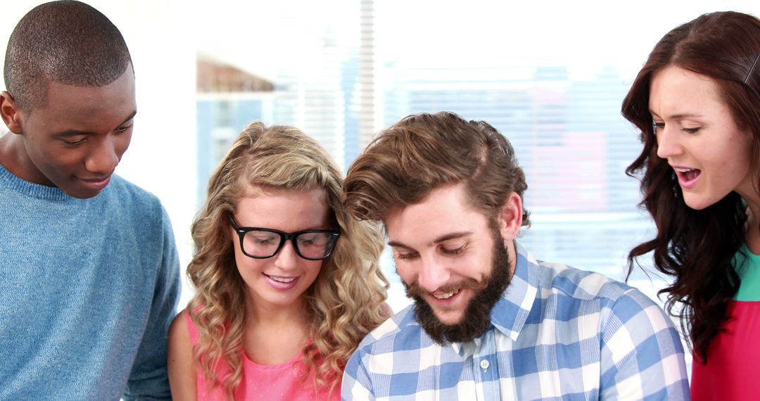 Diverse Young Adults Collaborating on Group Project