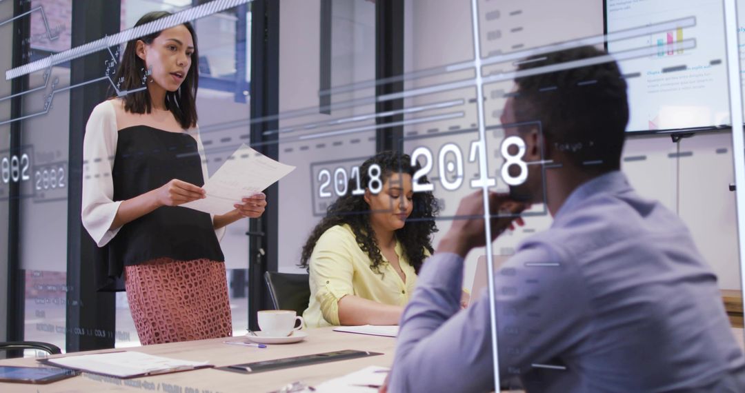 Professional Team Engaged in Corporate Presentation with Collaborative Discussion