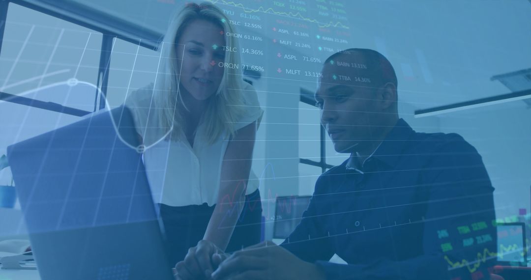 Financial Consulting Team Analyzing Market Trends on Laptop