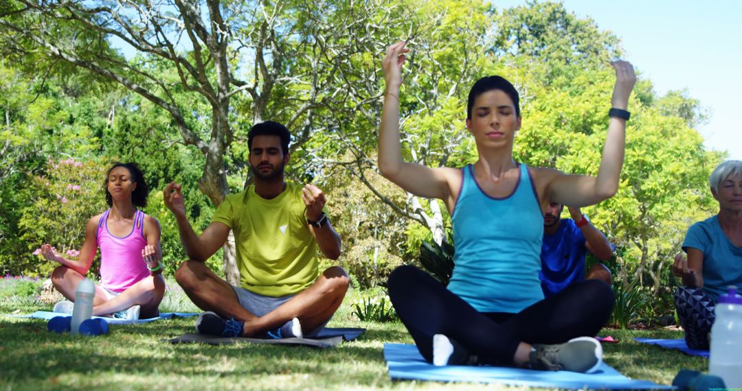 Diverse Group Meditating in Serene Outdoor Yoga Session - Free Images, Stock Photos and Pictures on Pikwizard.com