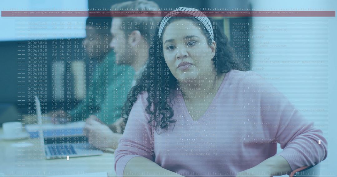 Diverse Team Analyzing Code in Modern Office Environment