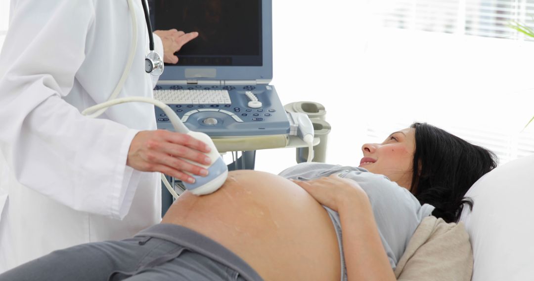 Pregnant Woman Undergoing Ultrasound Scan by Doctor - Free Images, Stock Photos and Pictures on Pikwizard.com