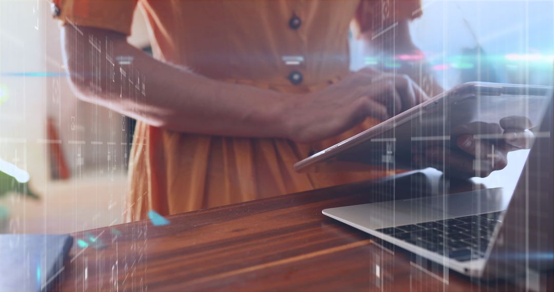Woman Using Laptop and Tablet with Web Interface Overlay