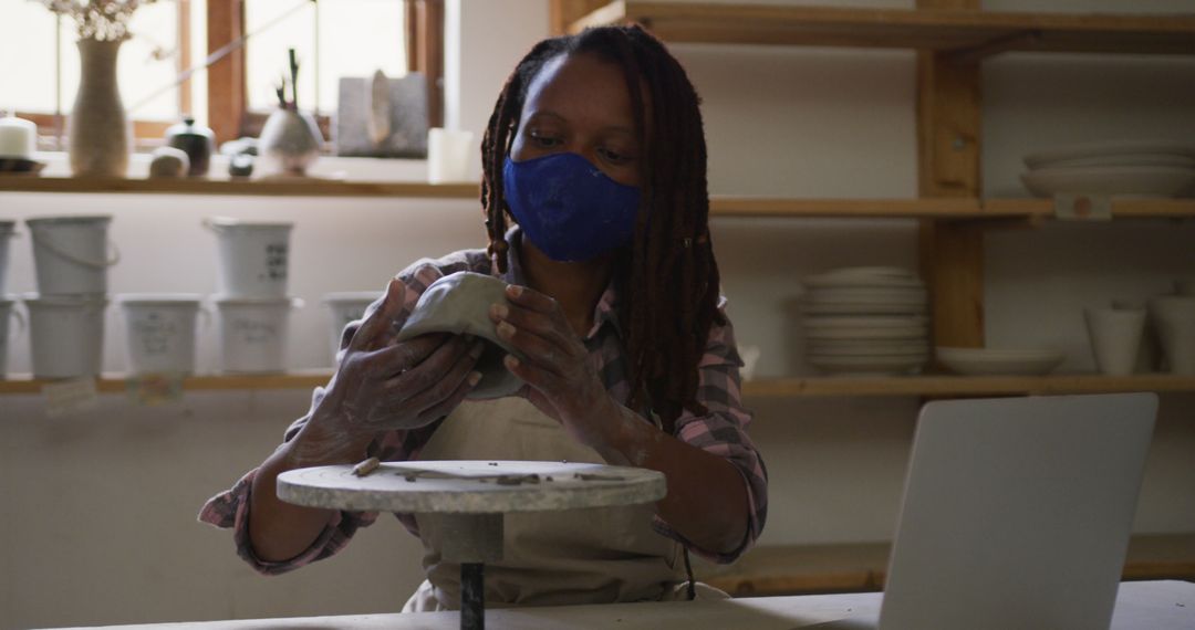 Female Potter Creating Ceramic Artwork in Studio - Free Images, Stock Photos and Pictures on Pikwizard.com