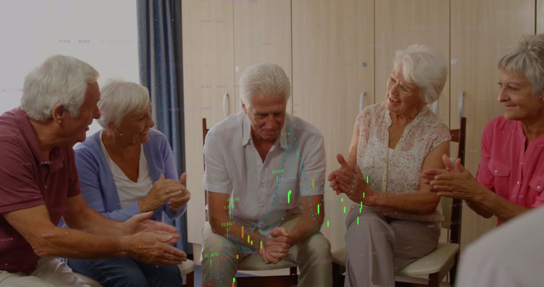 Vivacious Senior Group Enjoying Lively Conversation and Clapping