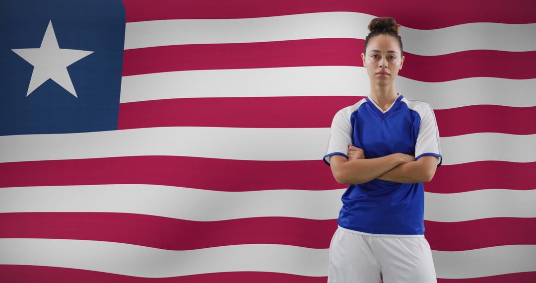 Confident Soccer Player Standing Against Falcon Design