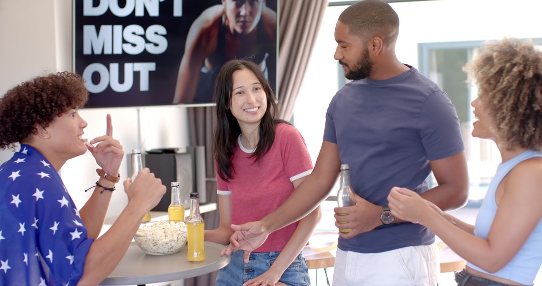 Diverse Friends Socializing Indoors with Drinks and Snacks