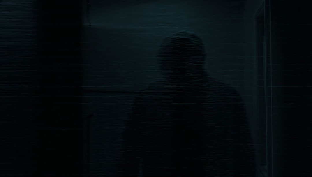 Mystery Figure in Dark Corridor with Static Overlay
