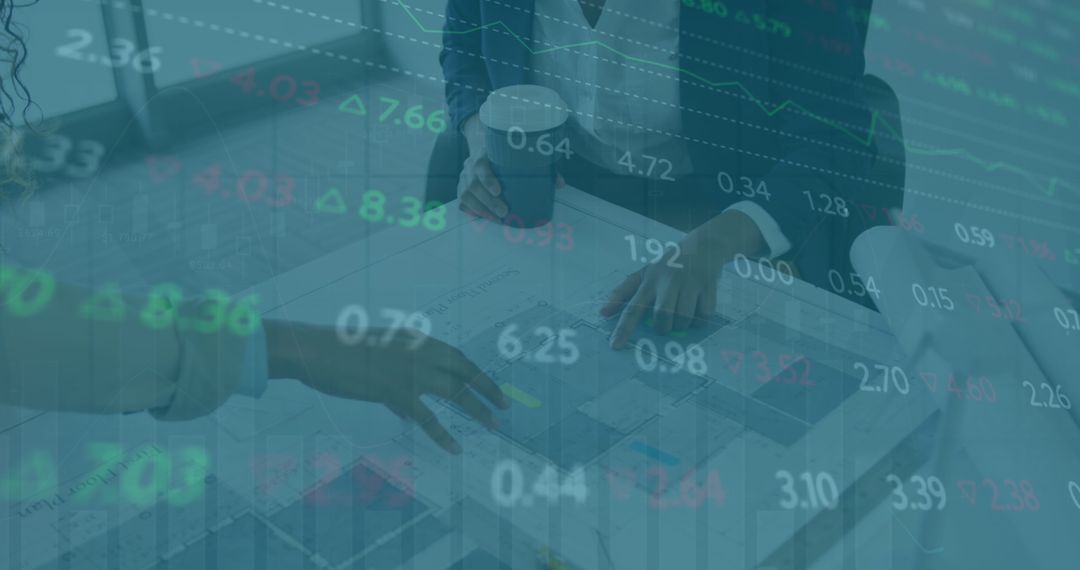 Business Team Analyzing Financial Charts in Office Environment