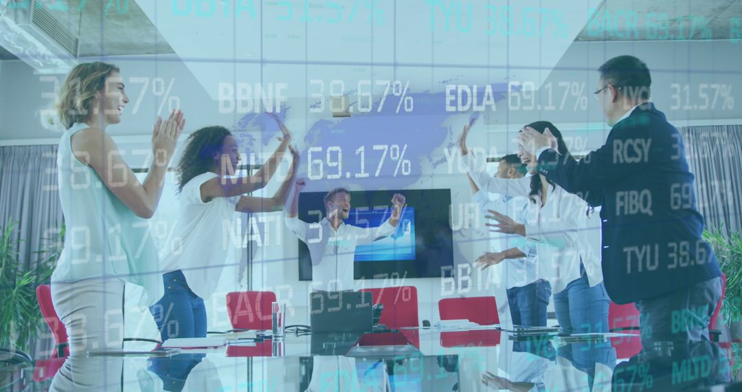 Diverse Business Team Celebrating Financial Success with Digital Interface Overlay