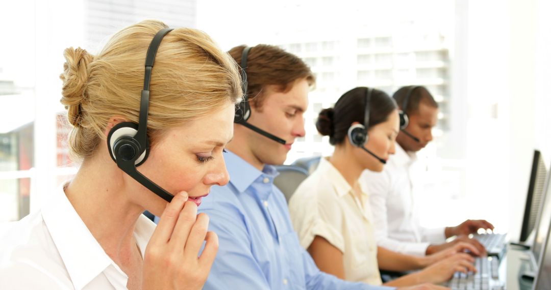 Customer Service Representatives Using Headsets in Office Environment - Free Images, Stock Photos and Pictures on Pikwizard.com