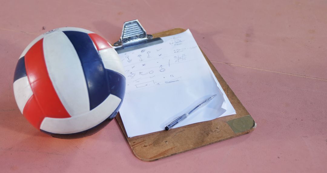 Volleyball Tactics Planning with Clipboard and Pen on Court - Free Images, Stock Photos and Pictures on Pikwizard.com