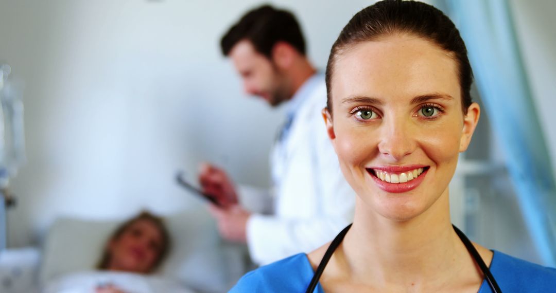 Smiling Female Nurse in Hospital Room with Doctor and Patient - Free Images, Stock Photos and Pictures on Pikwizard.com